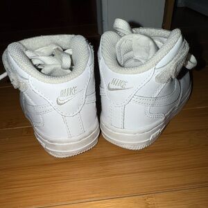 Nike Kids All-White Air Force sneakers